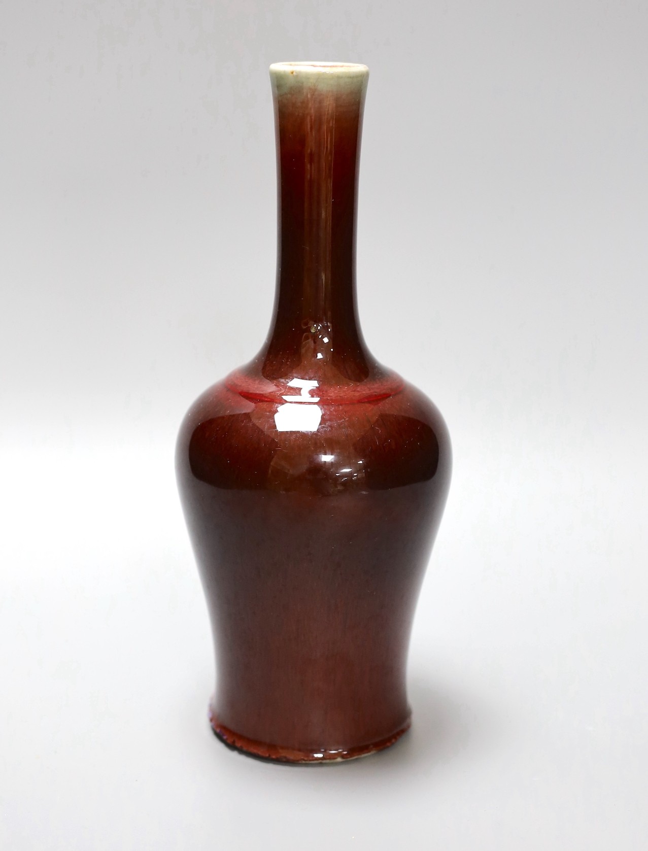 A Chinese sang de boeuf vase, 23cm